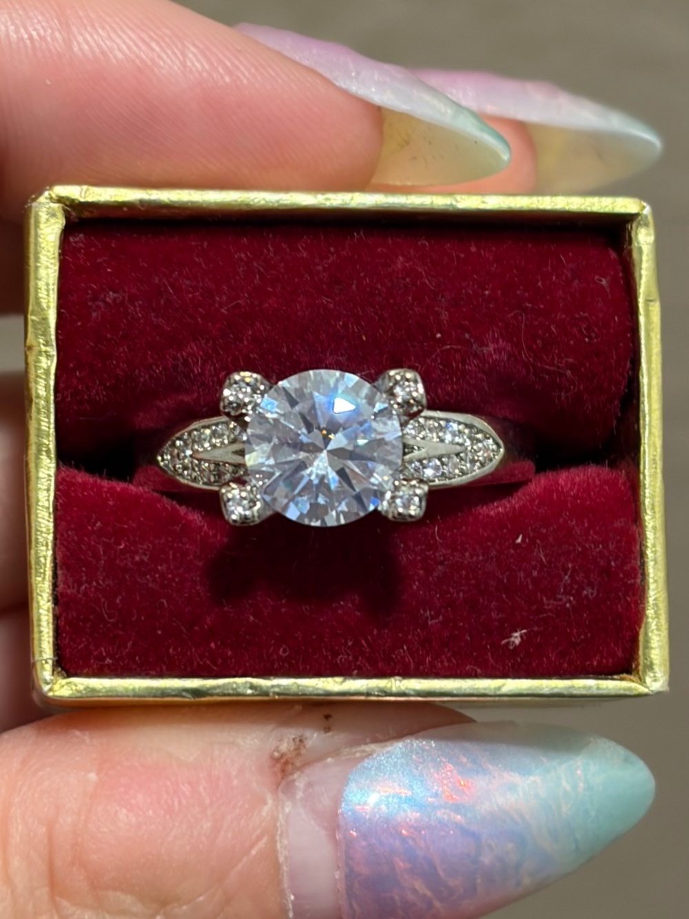 Sterling silver enhancement ring with white stones